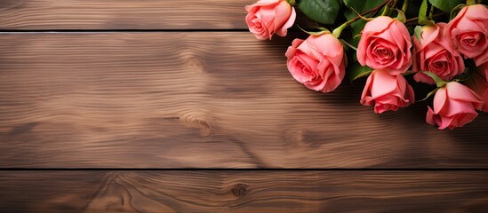 Leinwandbilder - A wooden background with a beautiful bouquet of roses leaving room for additional content