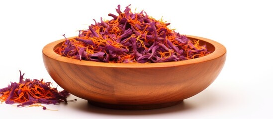 Poster - A white background showcases a wooden bowl holding a vibrant pile of saffron allowing for a copy space image 114 characters