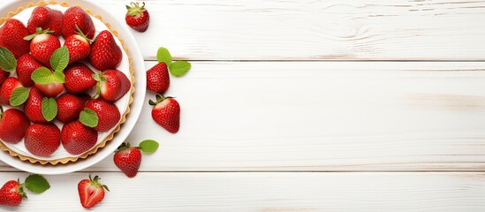 Poster - Top view of a delectable American strawberry dessert placed on a white wooden table The sweet dish features a combination of tart cake and pastry creating a mouthwatering treat Ample copy space image