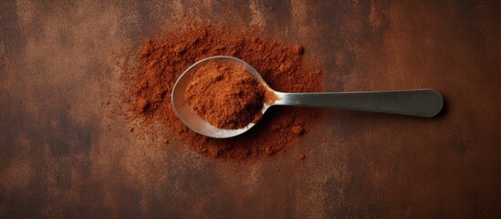 Poster - A top view of a spoon with coffee powder creating a visually appealing copy space image