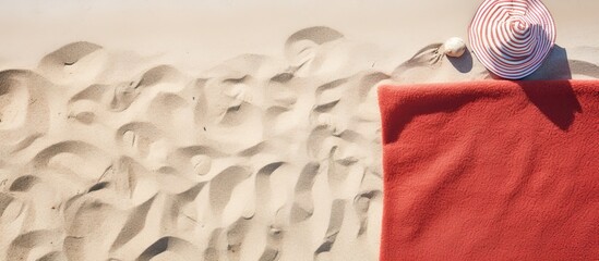 Aufkleber - Top view of beach accessories and towel on a sandy beach with ample space for text A perfect image to capture the essence of a summer vacation
