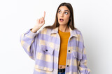 Fototapeta Na drzwi - Young caucasian woman isolated on purple background intending to realizes the solution while lifting a finger up