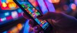 A closeup of a persons hand holding a smartphone with a vibrant and eyecatching online casino app design