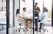 © peopleimages.com - Business people, meeting and presentation or briefing for new employees, training and learning in office. Corporate, team and discussion in workshop with mentor for education of job in boardroom