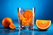 orange juice glass with oranges as an example orange juice glass  
glasses filled with recently extracted orange juice A glass filled with orange juice and oranges surrounding it

