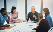 © peopleimages.com - Business people, architect and planning in meeting with blueprint for building design, brainstorming or discussion. Architecture, employee or collaboration with floor plan in boardroom with diversity
