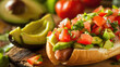 Mexican hot dog with avocado and salsa