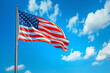 Sky blue background holds the American flag, symbolizing Memorial Day celebration.
