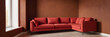 © Illustration - Red modular corner sofa against blank brown stucco wall with copy space. Loft interior design of modern living room design