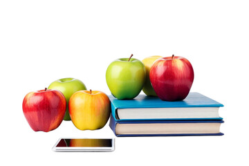 Wall Mural - A book with a bunch of apples on top of it. The apples are green, red, and yellow