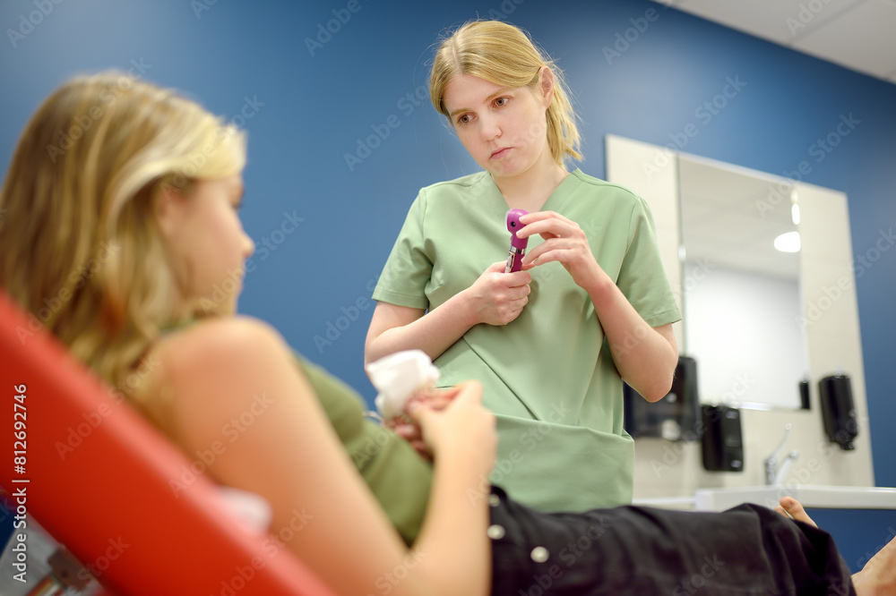 Girls Problem Medical Schoolgirl patient is at pediatrician appointment and feeling unwell ...