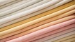 Assorted Textured Fabric Swatches in Soft Pastel Colors.