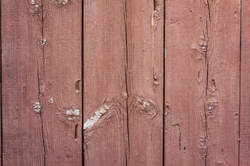 Wall Mural - Background, texture of old brown wooden boards of the wall, doors with peeled paint. Close-up photo, top view.