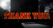 Image of red text thank you, over explosion and cityscape