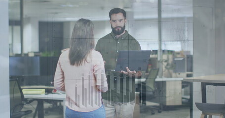 Poster - Image of graphs and changing numbers over diverse coworkers standing and discussing in office