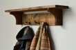 A coat rack with two coats hanging on it. Ideal for home decor or interior design concepts