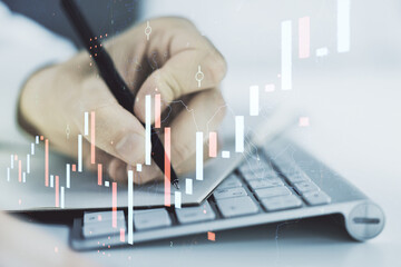 Poster - Multi exposure of abstract financial graph with hand writing in notebook on background, financial and trading concept