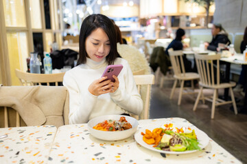 Sticker - Woman take photo on her dish in the restaurant