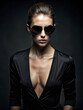 fashion portrait of Beautiful woman in sunglasses. beauty girl in black sexy dress