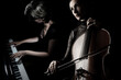 Cello piano player. Cellist and pianist classical musicians playing chamber music ensemble