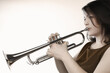 Trumpet player. Woman playing jazz musician