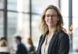 © Alicina - Business woman in an office with confidence and determination