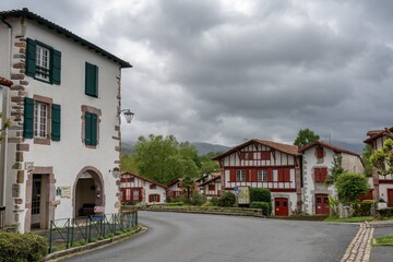 Wall Mural - typical colourful Basque houses in the mountain village of Ainhoa in the Pyrenees