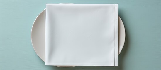 Wall Mural - A top down view of a light background with a clean napkin providing ample space for images