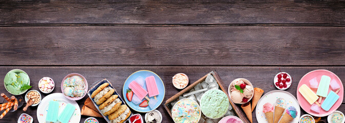 Poster - Cool summer food bottom border. Assorted ice cream, popsicles and frozen treats. Pastel colors. Top view on a dark wood banner background.