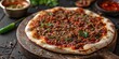 Lahmacun on a rustic wooden table, Thin Turkish pizza topped with minced meat, vegetables, and herbs, Freshly baked