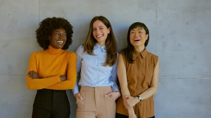 Female leader, manager and boss standing together as a team with a clear vision and mission for the growth and development of their company. Portrait of a group of business women in the office