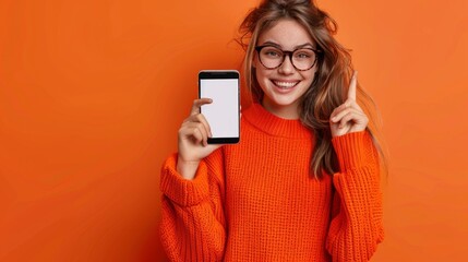 Wall Mural - Cheerful Woman Presenting Smartphone