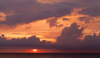 Wall Mural - seascape with colorful sky at sunset over ocean, natural background