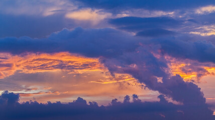 Wall Mural - colorful cloudy tropical sunset sky, natural background