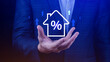 Real estate property investment concept, Asset management, Interest rates, inflation, loan mortgage, increase tax. Hand holding house icon with percent and rise arrow.
