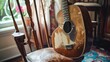 acoustic guitar and wooden armchair