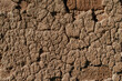 Wall of a traditional aged rural house made of clay