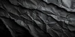 Aesthetic Beauty of Black Textured Paper with Creased Wrinkles and Dark Tones. Concept Black Textured Paper, Creased Wrinkles, Dark Tones, Aesthetic Beauty