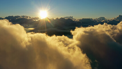 Wall Mural - Aerial view of clouds and morning sun