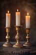 Elegant Candlelight: Two Gold Votive Holders with Flameless Candles on a Rustic Wooden Table
