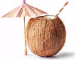 Tropical Coconut Drink with Straw and Umbrella on White Background
