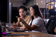 © Wavebreak Media - Diverse female business colleagues working late at office