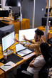 © Wavebreak Media - Diverse female colleagues discussing data, working late