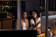 © Wavebreak Media - Diverse female business colleagues working late at office