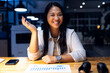 © Wavebreak Media - At office, biracial businesswoman laughing during video call
