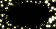 Image of golden lights twinkling against dark background, setting a festive mood