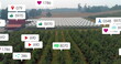Image of social media icons floating against aerial view of solar panels in grassland
