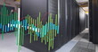 Image of multicolored graphs over data server racks in server room