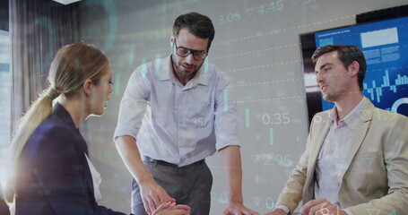Poster - Image of graphs, loading circles and trading board over caucasian coworkers discussing in office