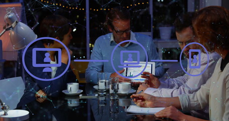 Poster - Image of network of digital icons against diverse businesspeople discussing together at office